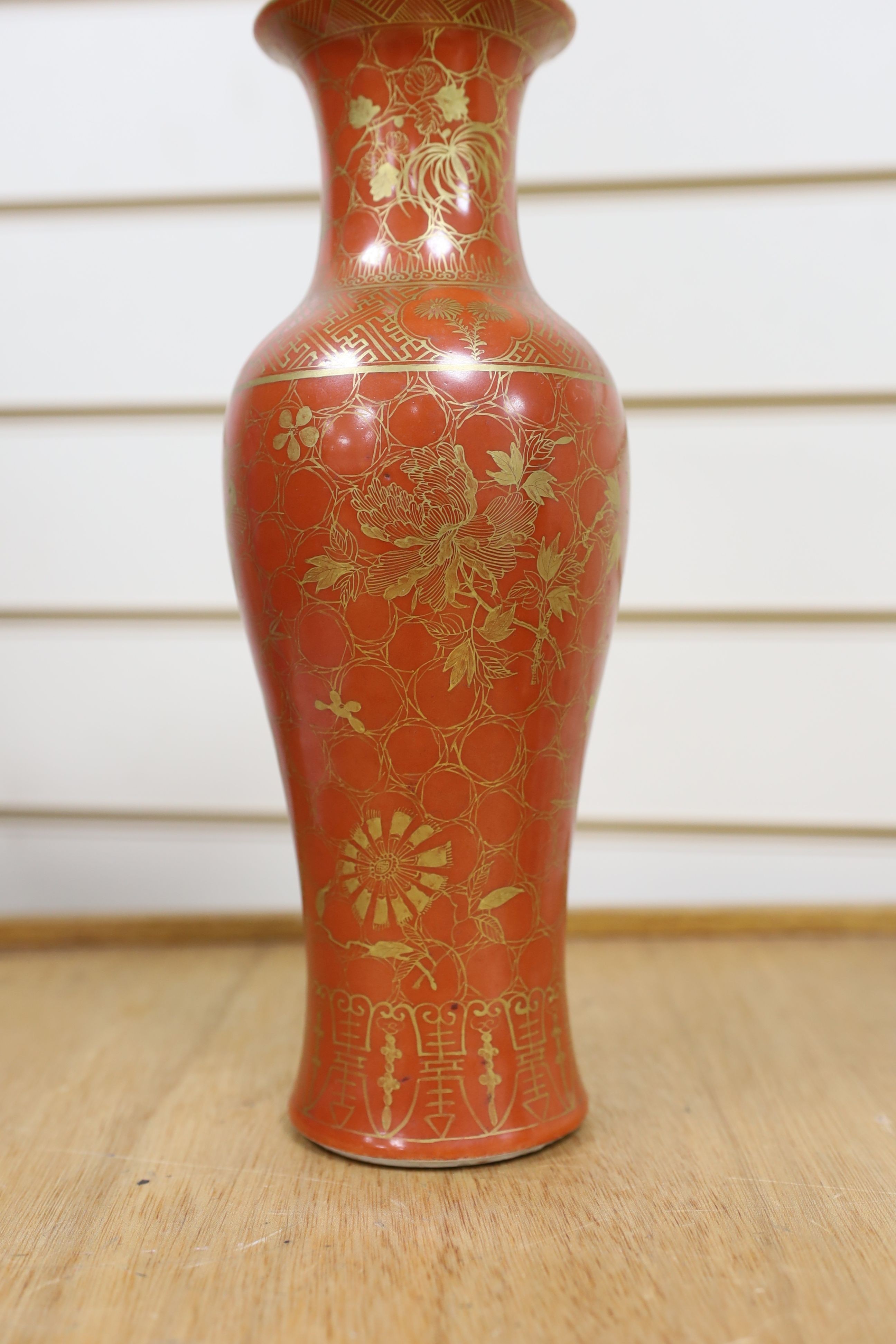 A Chinese blue and white gourd vase with landscape decoration, a similar blue and white sleeve vase and a Japanese Kutani vase